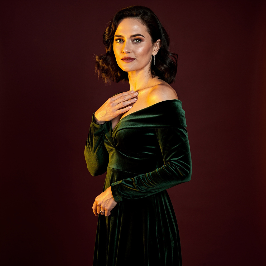 Portrait of a Dutch stage actress wearing a dark green velvet dress